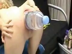 Big plastic water bottle stretches out her pussy tube porn video